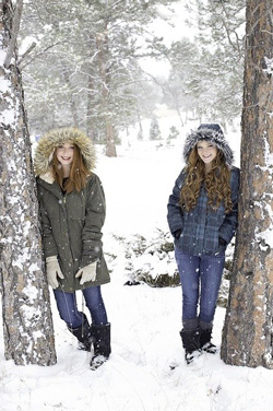 Sisters in a snowy forest